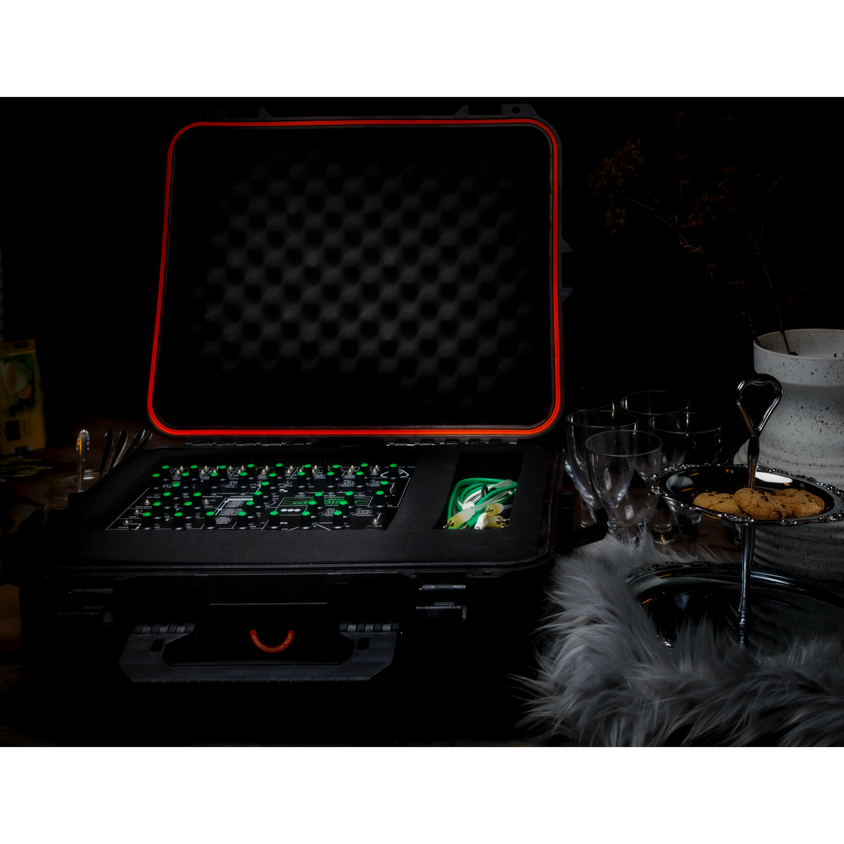 swEnigiser Limited Edition in open flight case on a table, moody lighting